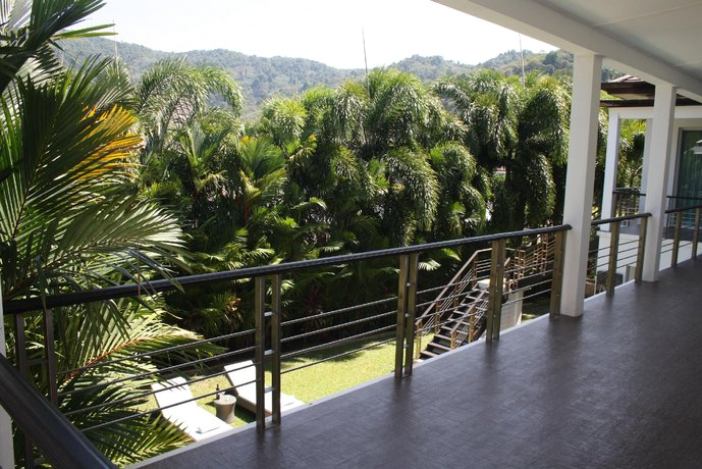 Modern villa with tropical mountain views and large private pool close to beach